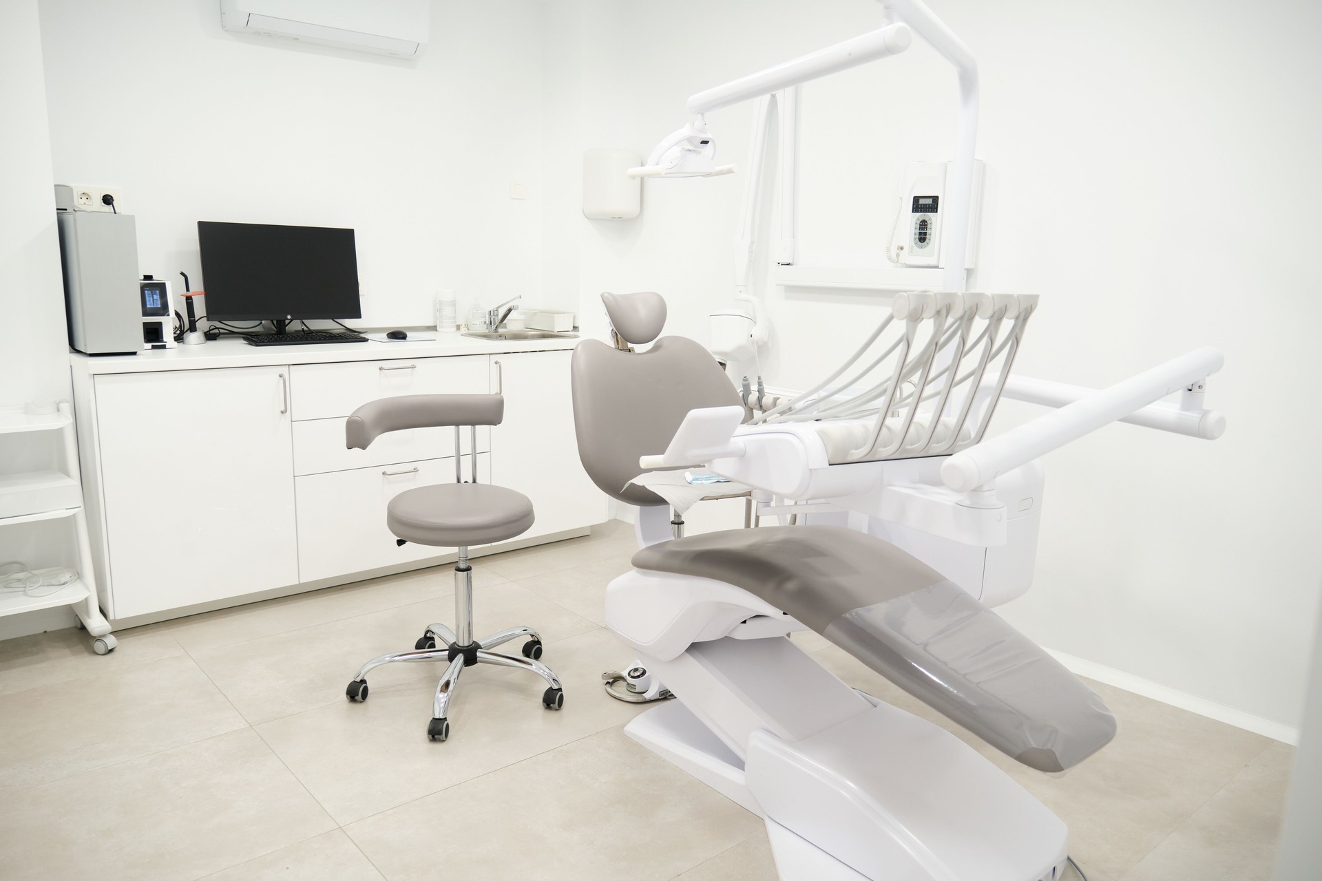 Modern dental clinic showing examining chair and other equipment